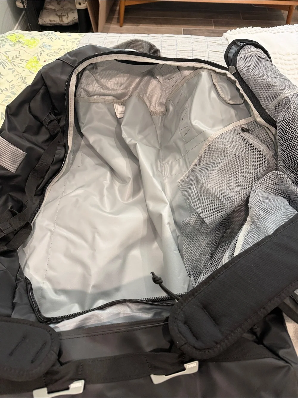 Thule Chasm Duffle 130L Black Travel Duffle with Gray Mesh Pocket